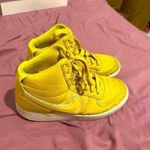 Yellow Nike vandal high tops